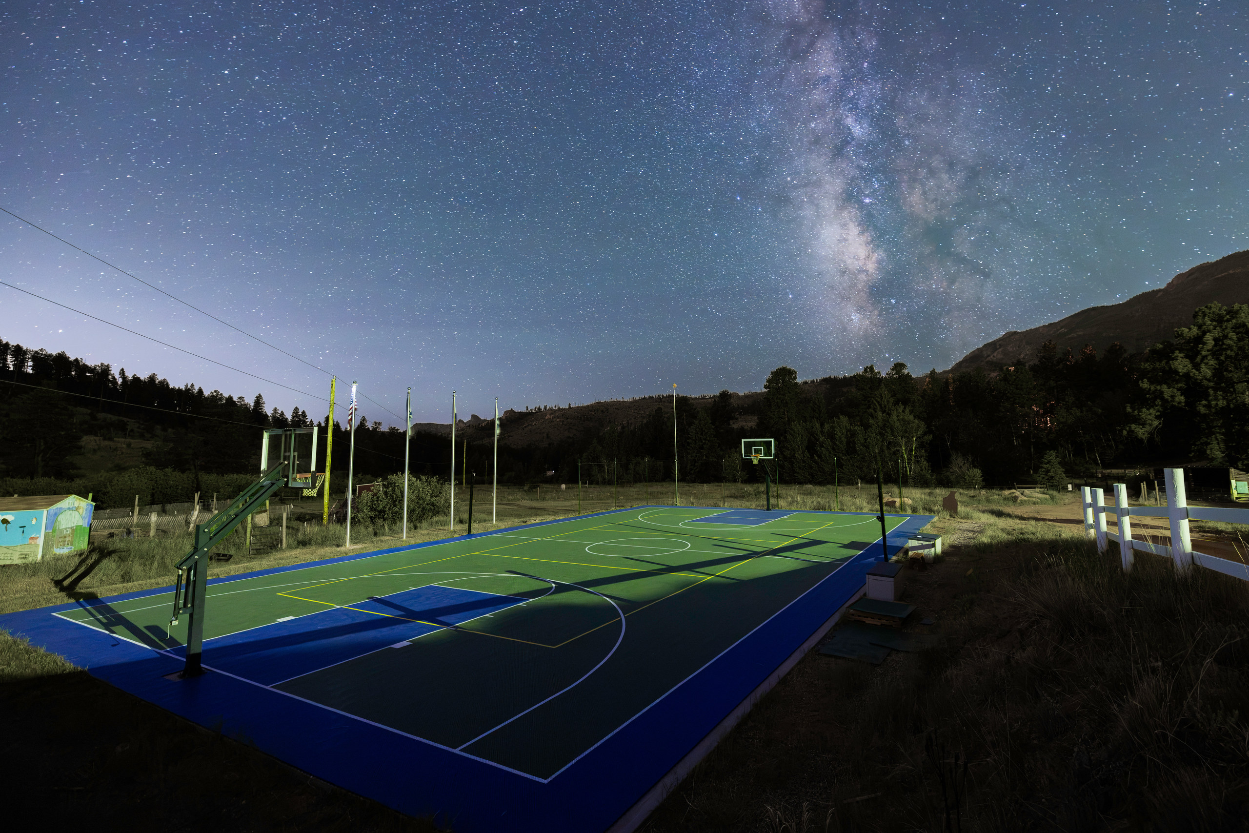 The Milky Way over the basketball court at Ramah in the Rockies